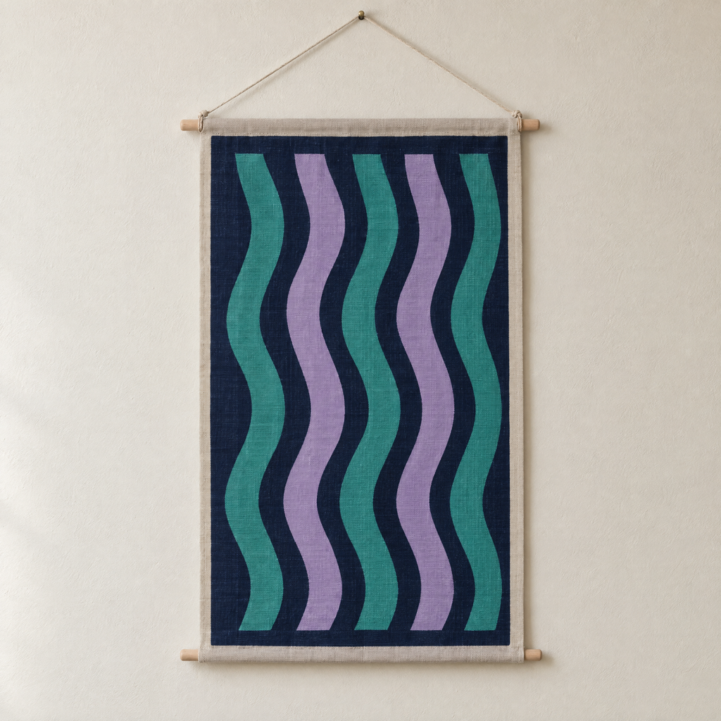 Aurora screen-printed canvas wall hanging on beech dowels, hung on a plain wall