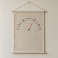 Barometer screen-printed canvas wall hanging on beech dowels, hung on a plain wall