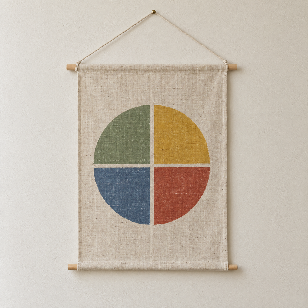 Four Seasons screen-printed canvas wall hanging on beech dowels, hung on a plain wall