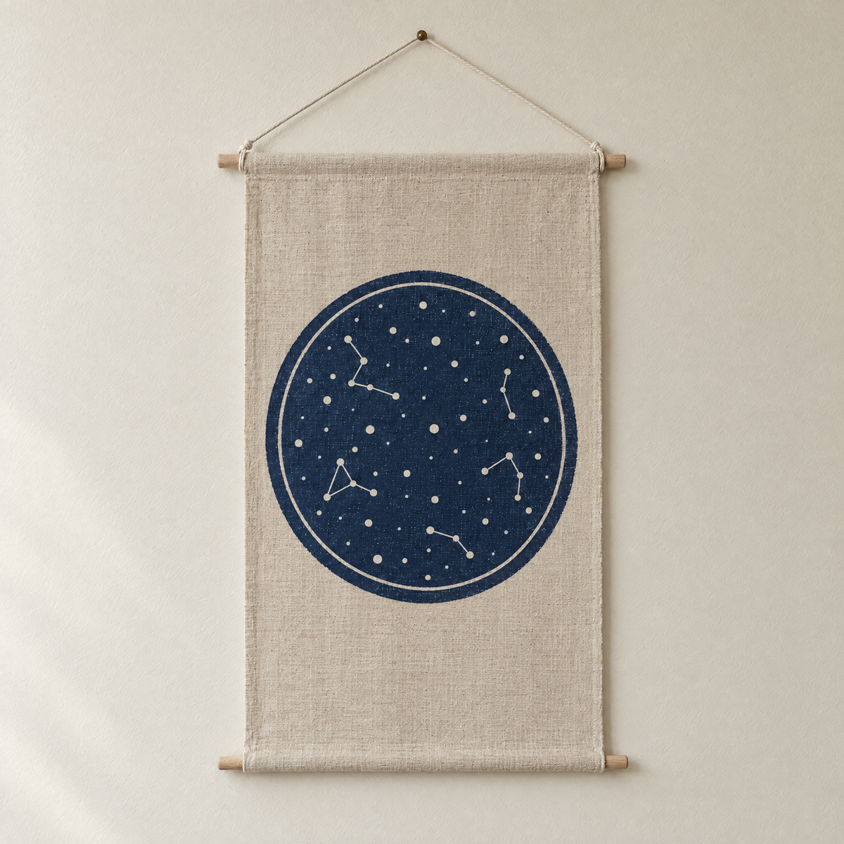 Star Chart screen-printed canvas wall hanging on beech dowels, hung on a plain wall